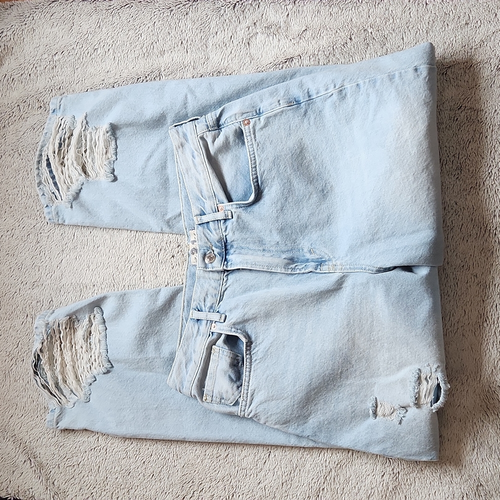 We The Free Distressed jeans size 31  flawed distressed hem Free People